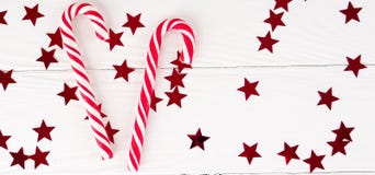 Christmas candy cane on white wood background, Christmas decors royalty free stock photo Christmas candy cane on white wood background, Christmas decors royalty free stock photo