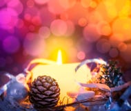 Christmas Card With Candle, Spruce Buds And Scenery On Bokeh Stock Photo