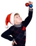 Christmas Child In A Red Hat Stock Photography