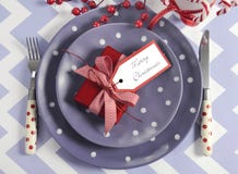 Christmas children family party table place settings in purple, red and white theme Stock Photography Christmas children family party table place settings in purple, red and white theme Stock Photography