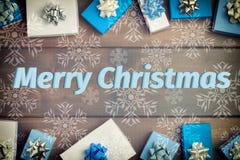 Christmas composition, beautiful frame. Small blue and white gift boxes, with beautiful silver bows. The inscription royalty free stock images Christmas composition, beautiful frame. Small blue and white gift boxes, with beautiful silver bows. The inscription royalty free stock images