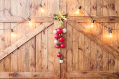 Christmas decoration on old grunge wooden board. warm gold garland lights stock photo Christmas decoration on old grunge wooden board. warm gold garland lights stock photo