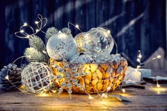 Christmas decoration in wicker basket with electric Stock Photos Christmas decoration in wicker basket with electric Stock Photos