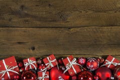 Christmas frame or border with red presents on wooden old background. royalty free stock photos Christmas frame or border with red presents on wooden old background. royalty free stock photos