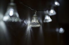 Christmas garland in the form of openwork steel bells stock photography Christmas garland in the form of openwork steel bells stock photography