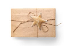 Christmas gift box wrapped in brown recycled paper and tied sack rope with a star top view isolated on white background Royalty Free Stock Image Christmas gift box wrapped in brown recycled paper and tied sack rope with a star top view isolated on white background Royalty Free Stock Image