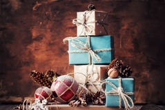 Christmas Gifts, Nuts, Fir Tree Toys On Wooden Background Royalty Free Stock Images Christmas Gifts, Nuts, Fir Tree Toys On Wooden Background Royalty Free Stock Images