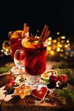 Christmas mulled red wine with spices and fruits on a wooden rustic table royalty free stock photography Christmas mulled red wine with spices and fruits on a wooden rustic table royalty free stock photography
