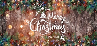 Christmas and New Year Typographical on wooden background with Fir branches. stock images Christmas and New Year Typographical on wooden background with Fir branches. stock images