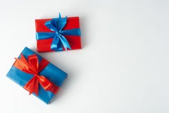 Christmas, Party Or Birthday Concept. Blue And Red Gift Boxes Isolated Over White Background. Copy Space Stock Images