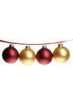 Christmas photo of red and gold ornaments strung on plaid ribbon royalty free stock images Christmas photo of red and gold ornaments strung on plaid ribbon royalty free stock images