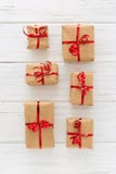 Christmas presents organized on a wooden background royalty free stock images Christmas presents organized on a wooden background royalty free stock images