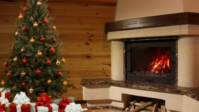 Christmas room. Christmas tree by the fireplace Christmas room. Christmas tree by the fireplace