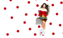Christmas scene. Sexy Santa. Beauty model girl wearing red party costume Royalty Free Stock Images Christmas scene. Sexy Santa. Beauty model girl wearing red party costume Royalty Free Stock Images