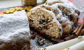 Christmas shtollen on a green background. Traditional German dessert royalty free stock images Christmas shtollen on a green background. Traditional German dessert royalty free stock images