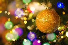 Christmas tree decorated with golden baubles stock photo Christmas tree decorated with golden baubles stock photo