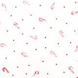 Christmas winter pattern made of candy canes and red confetti on white background. Flat lay, top view. royalty free stock images Christmas winter pattern made of candy canes and red confetti on white background. Flat lay, top view. royalty free stock images