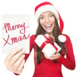 Christmas woman showing copy space sign Royalty Free Stock Photos Christmas woman showing copy space sign Royalty Free Stock Photos
