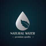 Chrome drop symbol with leaf on dark background, natural label for mineral water Stock Images Chrome drop symbol with leaf on dark background, natural label for mineral water Stock Images