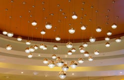 Chrystal chandelier lamp on the ceiling in Dining room Adjusting the image in a Luxury tone. stock photo Chrystal chandelier lamp on the ceiling in Dining room Adjusting the image in a Luxury tone. stock photo