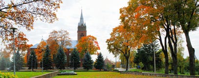 Church in little town at autumn time Stock Images Church in little town at autumn time Stock Images