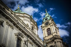Church St. Nicholas in Prague - time - arhitecture stock image Church St. Nicholas in Prague - time - arhitecture stock image