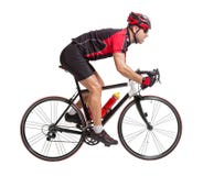 Ciclista que monta una bicicleta Imagenes de archivo Ciclista que monta una bicicleta Imagenes de archivo