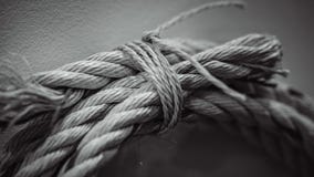 Circle Brown Rope Tied On Wall stock photo Circle Brown Rope Tied On Wall stock photo