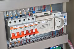Circuit breakers, control relay, socket and thermostat in electrical Cabinet. stock image Circuit breakers, control relay, socket and thermostat in electrical Cabinet. stock image
