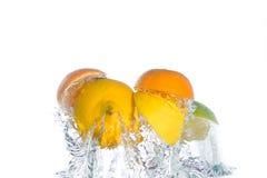 Citrus fruit jumping out of the water stock images Citrus fruit jumping out of the water stock images