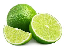 Citrus lime fruit with slice and half isolated on white stock images Citrus lime fruit with slice and half isolated on white stock images