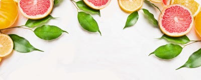 Citrus Slices Of Orange,lemon And Grapefruit With Green Leaves, Banner For Website Stock Photos Citrus Slices Of Orange,lemon And Grapefruit With Green Leaves, Banner For Website Stock Photos