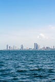 City buildings near the sea, sky and clouds. Royalty Free Stock Photo City buildings near the sea, sky and clouds. Royalty Free Stock Photo