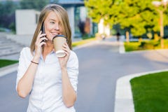 City lifestyle business woman using smartphone. Young professional female businesswoman on smart phone Royalty Free Stock Photo City lifestyle business woman using smartphone. Young professional female businesswoman on smart phone Royalty Free Stock Photo