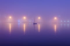 City Lights Reflecting On The Sea In Fog - Turkey