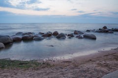 Baltic sea with waves, rocks and blue sky. Summer evening. royalty free stock images Baltic sea with waves, rocks and blue sky. Summer evening. royalty free stock images