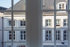 City view, old buildings in the Netherlands, big window stock photo City view, old buildings in the Netherlands, big window stock photo