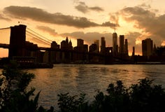Cityscape van New York bij zonsondergang De Stad van New York, financieel district stock fotografie Cityscape van New York bij zonsondergang De Stad van New York, financieel district stock fotografie