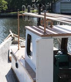 Clamboat moored in a long island canal stock photos Clamboat moored in a long island canal stock photos