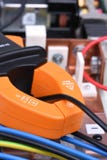 Clamp meter measure current on cable on power supply devices Stock Photos Clamp meter measure current on cable on power supply devices Stock Photos