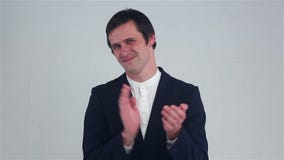 Clapping sarcastically. young man applauding. stock video footage Clapping sarcastically. young man applauding. stock video footage