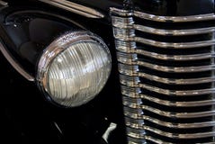 Classic Car Headlight And Gril Stock Image