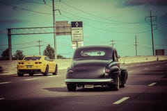 Classic car on highway Classic car on highway