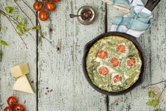 Classic omelet with cherry tomatoes, cheese and herbs stock image Classic omelet with cherry tomatoes, cheese and herbs stock image