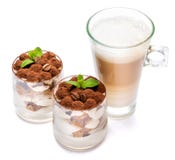 Classic tiramisu dessert in a glass and cup of coffee isolated on a white background with clipping path stock photos Classic tiramisu dessert in a glass and cup of coffee isolated on a white background with clipping path stock photos