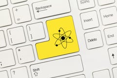 Clavier conceptuel blanc - clé jaune avec le symbo d'énergie nucléaire photos stock Clavier conceptuel blanc - clé jaune avec le symbo d'énergie nucléaire photos stock