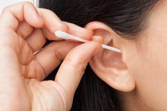 Cleaning ear royalty free stock photography Cleaning ear royalty free stock photography