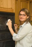 Cleaning the house - microwave oven Stock Images Cleaning the house - microwave oven Stock Images