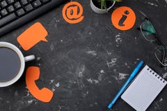 Client support service. Contact us for feedback. desktop with notepad and various feedback icons. top view royalty free stock photos Client support service. Contact us for feedback. desktop with notepad and various feedback icons. top view royalty free stock photos