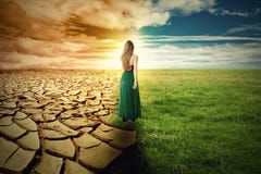 A Climate Change Concept Image. Landscape green grass and drought land